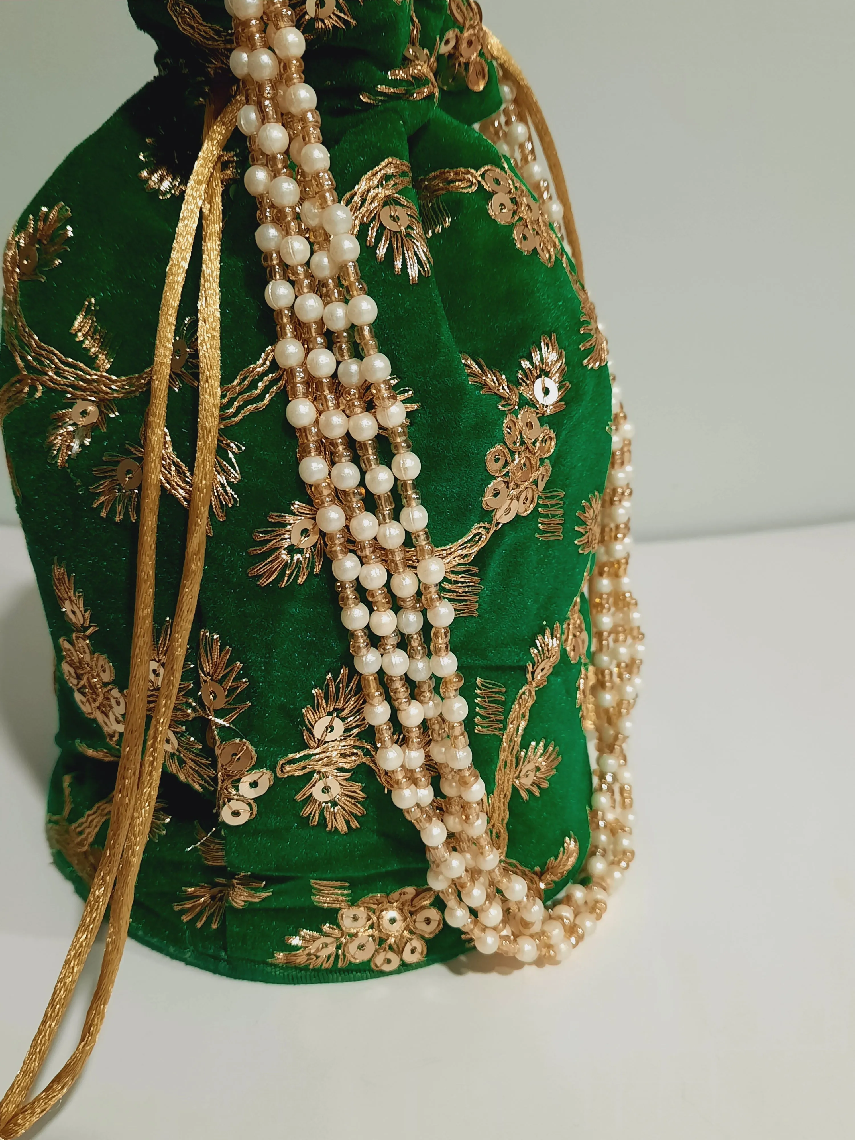 Green clutch for weddings and parties with beaded chain