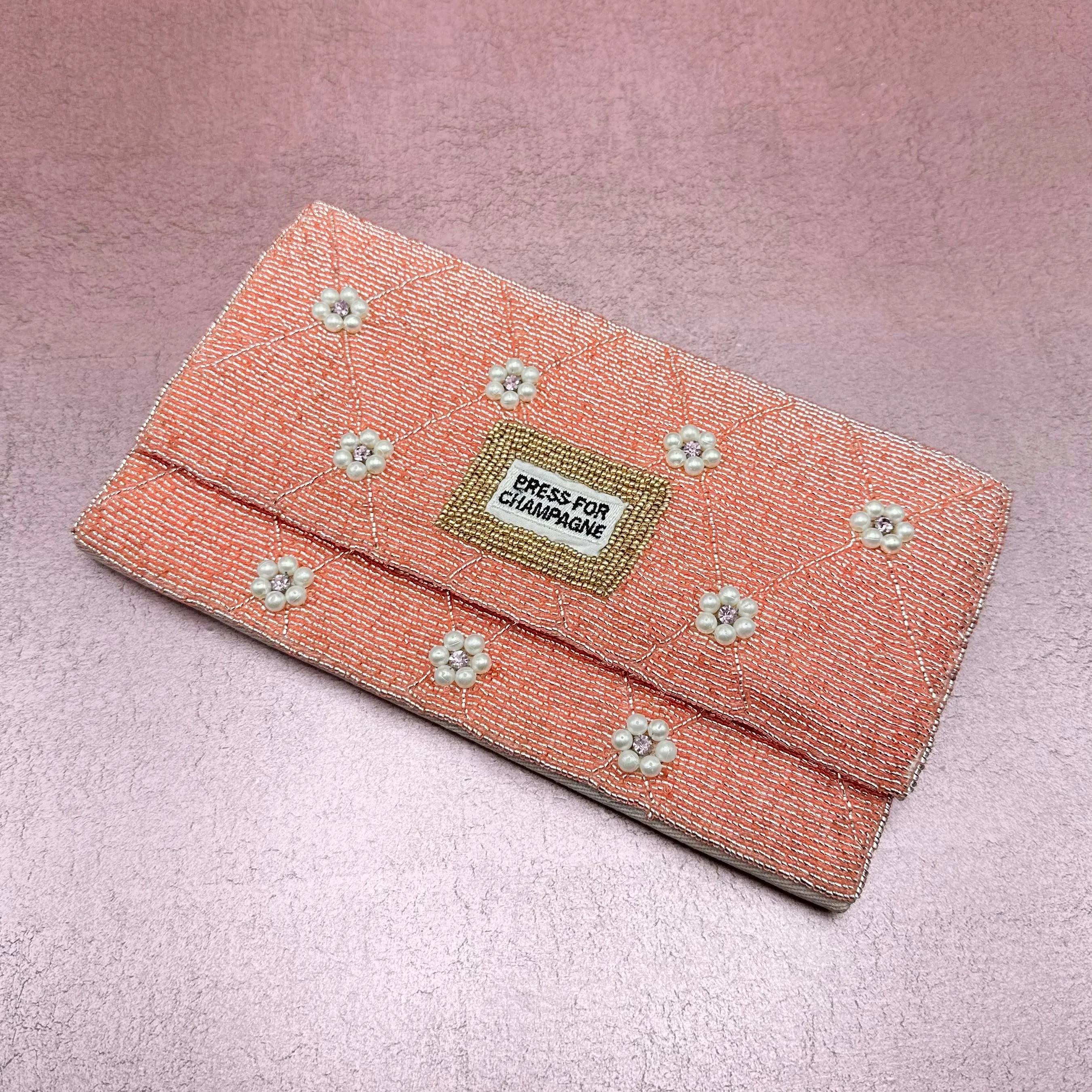 'Press for Champagne' Beaded Clutch