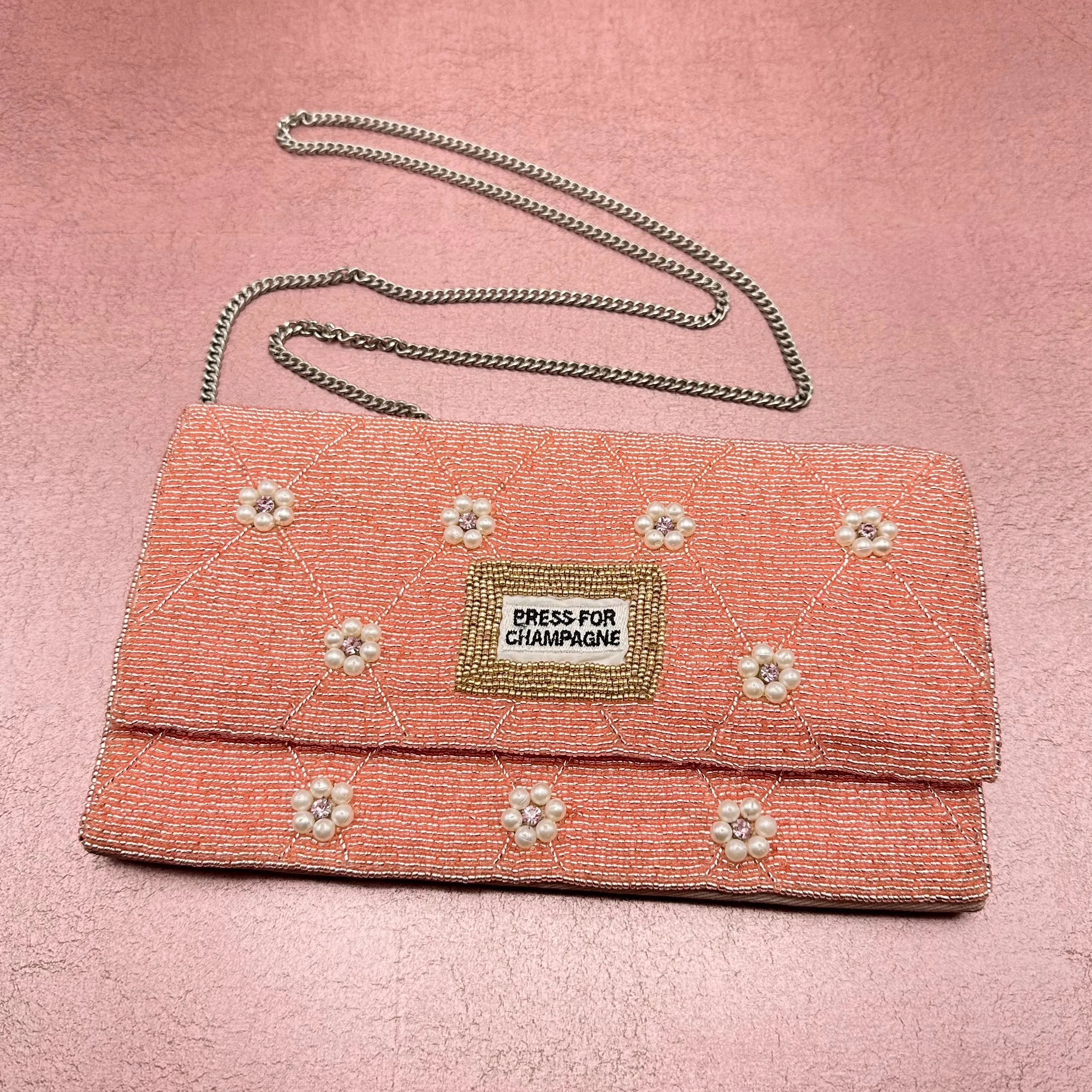 'Press for Champagne' Beaded Clutch