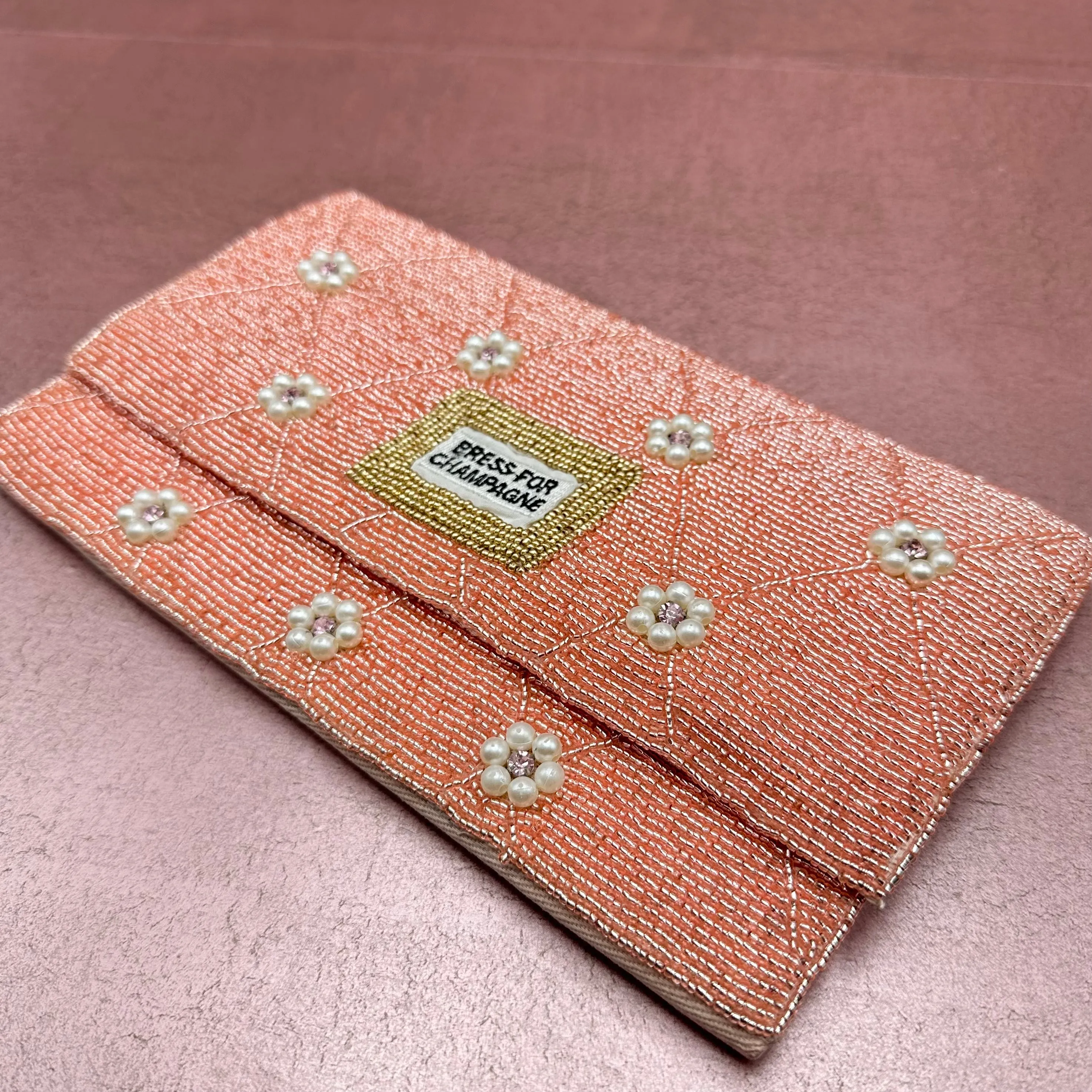 'Press for Champagne' Beaded Clutch